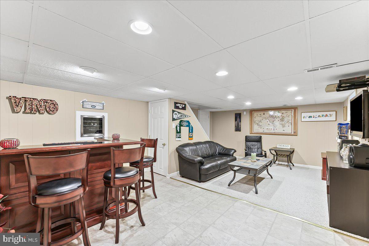 243 Rambling Way Springfield, PA 19064 - Photo 26 of 42 a view of a livingroom with furniture and window