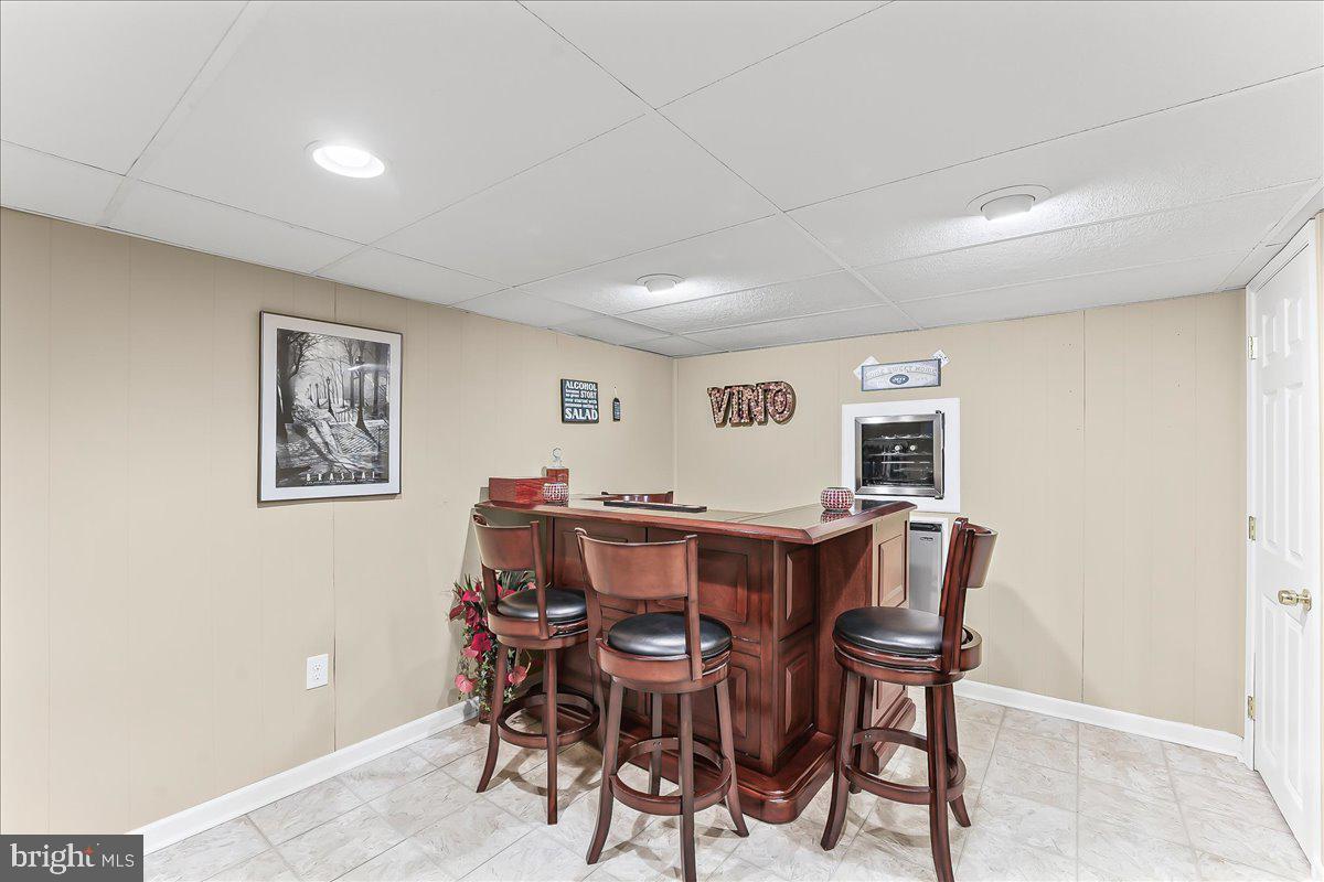 243 Rambling Way Springfield, PA 19064 - Photo 27 of 42 a view of a dining room with furniture