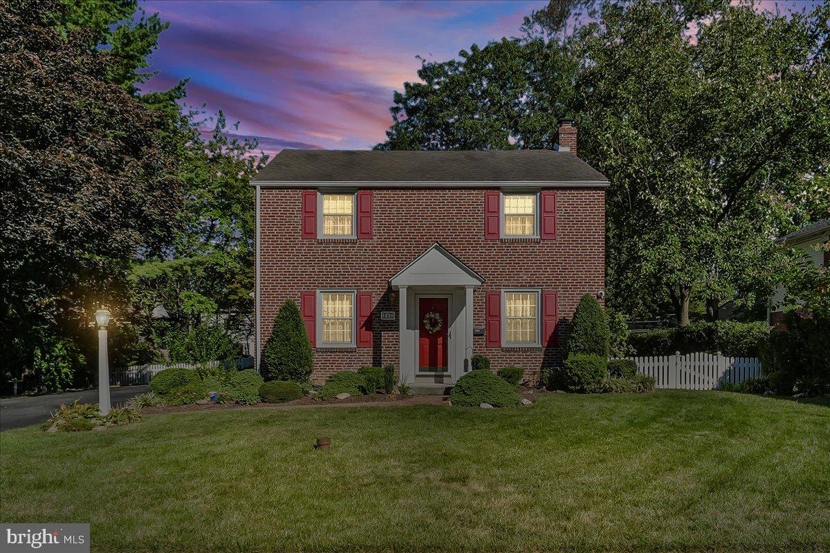 243 Rambling Way Springfield, PA 19064 - Photo 3 of 42 a front view of a house with a yard