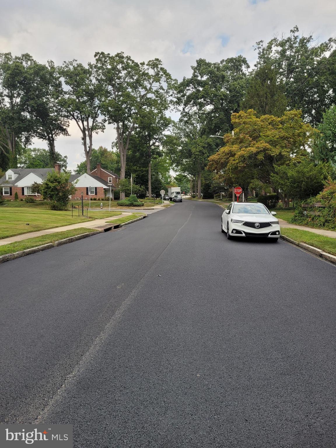 243 Rambling Way Springfield, PA 19064 - Photo 36 of 42 a view of street with parked cars