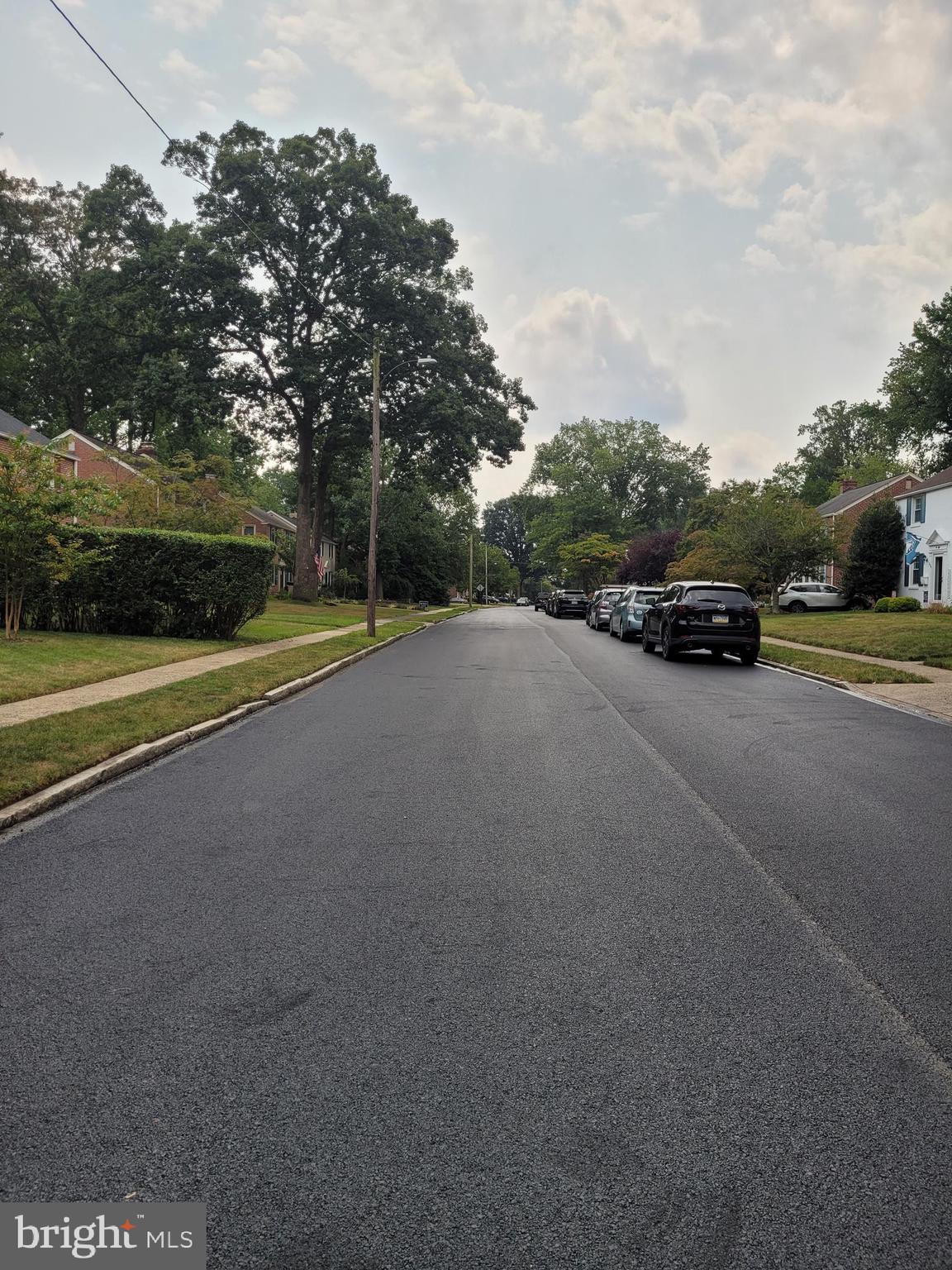 243 Rambling Way Springfield, PA 19064 - Photo 38 of 42 a view of a road with a car parked on the road
