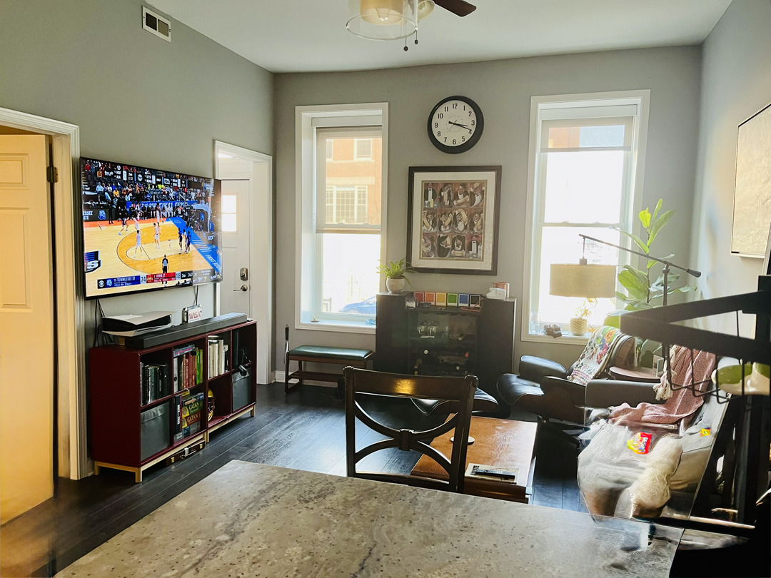 1300 North Greenview Avenue, Unit 2F Chicago, IL 60642 - Photo 6 of 11 a living room with furniture and a flat screen tv
