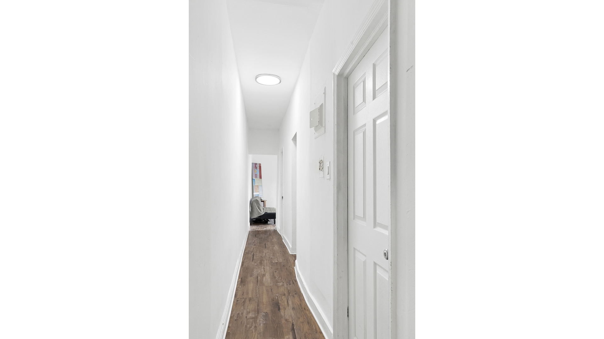 30 Macombs Place, Unit 54 Manhattan, NY 10039 - Photo 5 of 6 a view of a hallway with toilet