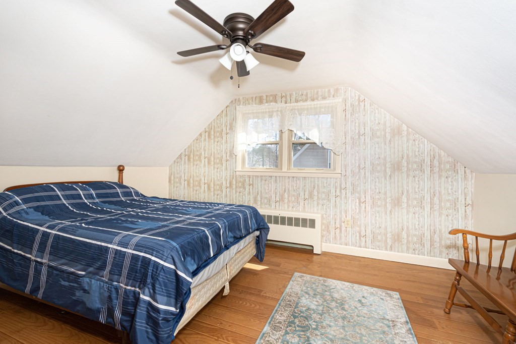 78 Lancaster Road Clinton, MA 01510 - Photo 24 of 29 a bedroom with a bed and a window