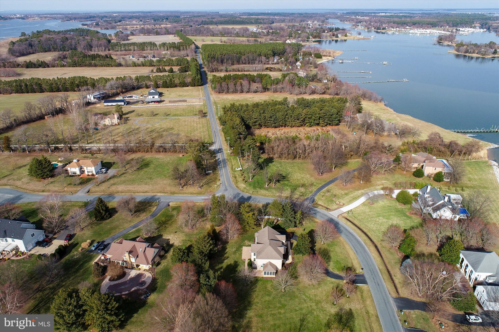 2802 Cox Neck Road Chester, MD 21619 - Photo 39 of 55 an aerial view of residential houses with outdoor space