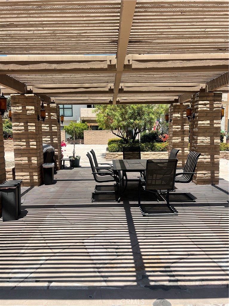 12300 Montecito Road, Unit 24 Seal Beach, CA 90740 - Photo 5 of 8 a view of a terrace with seating space