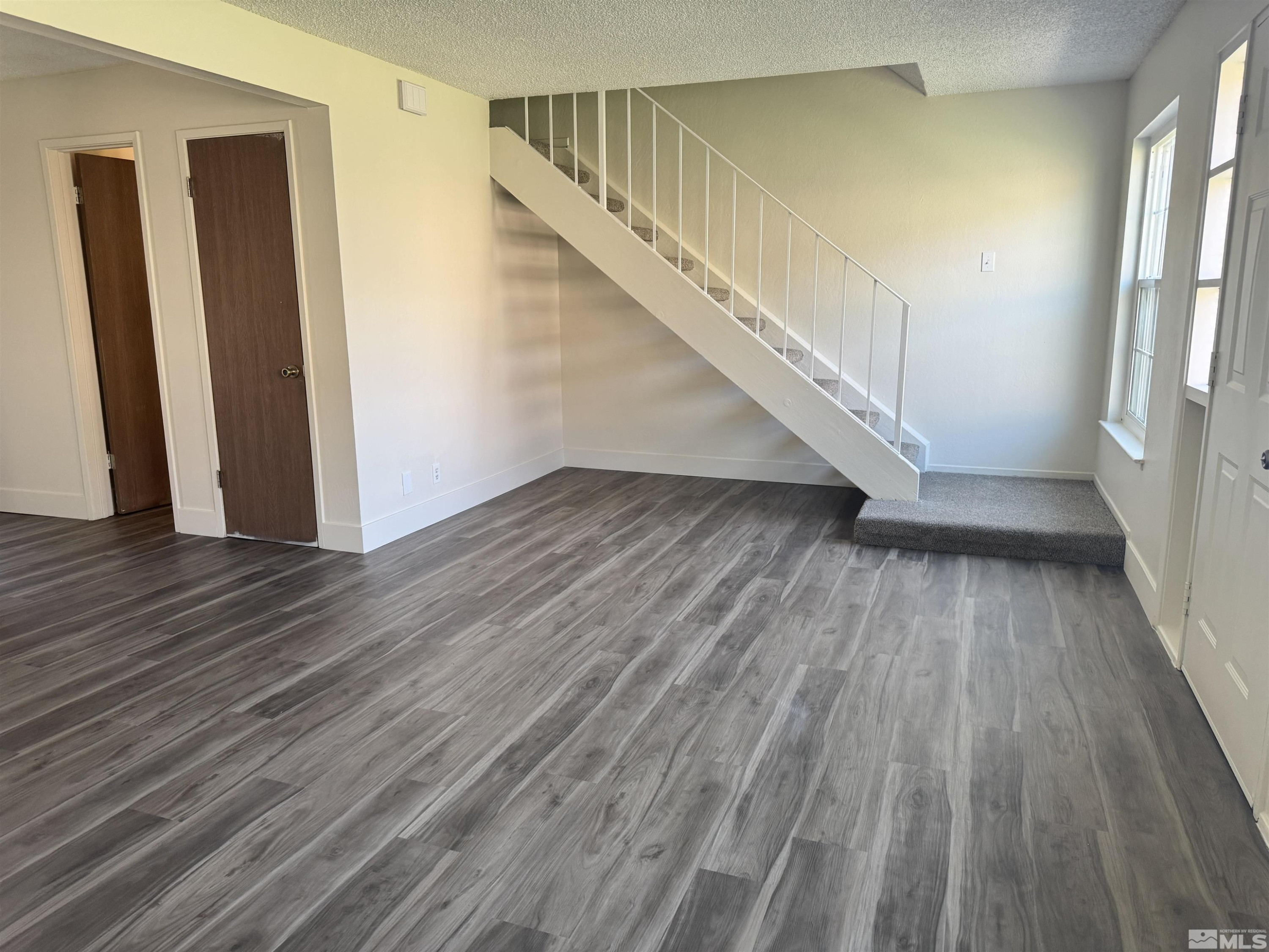 445 Pine Meadows Drive, Unit 29 Sparks, NV 89431 - Photo 3 of 13 a view of entryway with wooden floor
