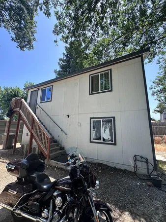 a backyard of a house with lots of green space