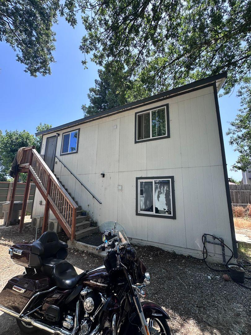 454 Colin Kelly Drive Roseville, CA 95747 - Photo 1 of 13 a backyard of a house with lots of green space