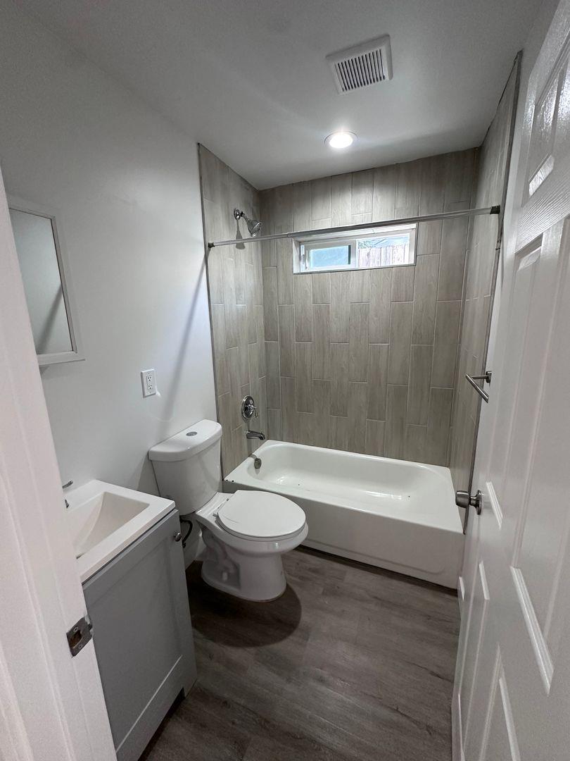 454 Colin Kelly Drive Roseville, CA 95747 - Photo 6 of 13 a bathroom with a double vanity sink toilet and shower