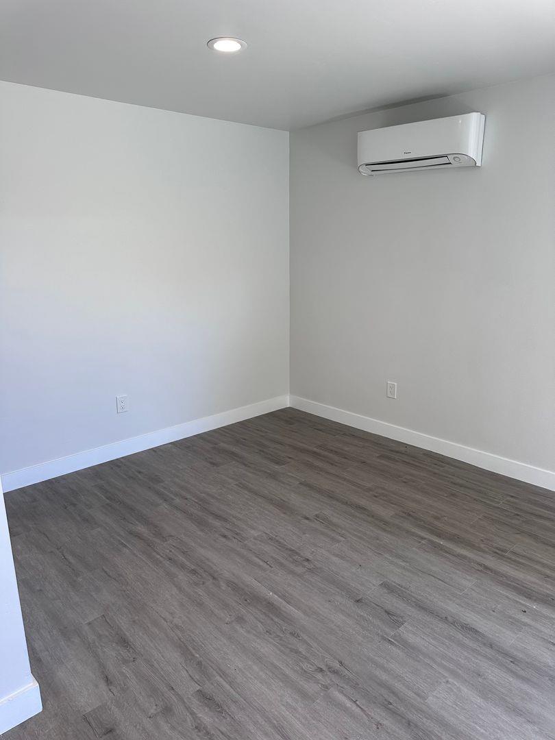 454 Colin Kelly Drive Roseville, CA 95747 - Photo 8 of 13 a view of a room with wooden floor