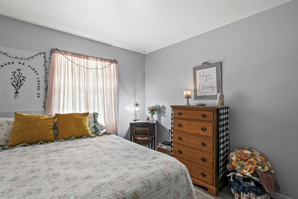 2792 Hancock Road Hancock, MA 01237 - Photo 16 of 38 a bedroom with a bed and a dresser