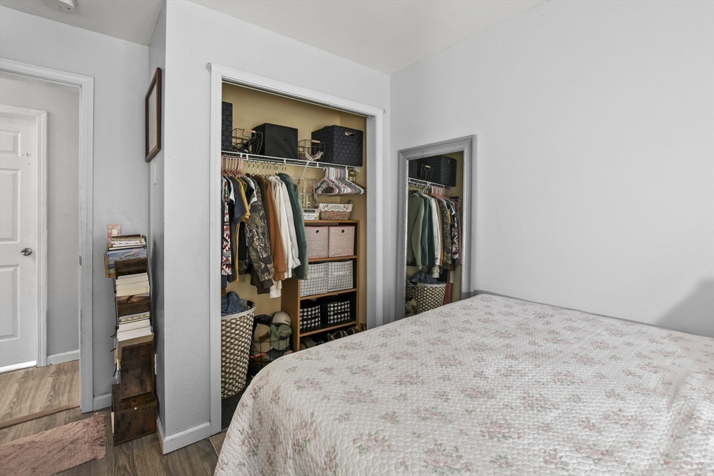 2792 Hancock Road Hancock, MA 01237 - Photo 18 of 38 a bedroom with a bed and a closet