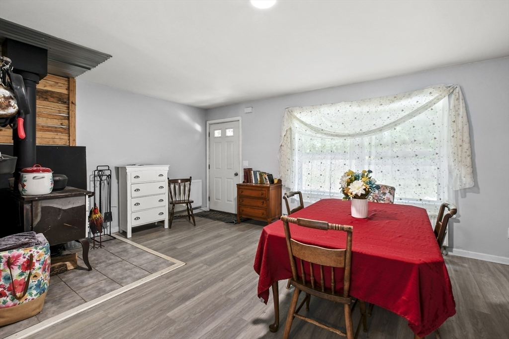 2792 Hancock Road Hancock, MA 01237 - Photo 8 of 38 a view of a dining room with furniture and a window
