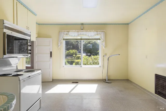 a bathroom with a sink and large mirror