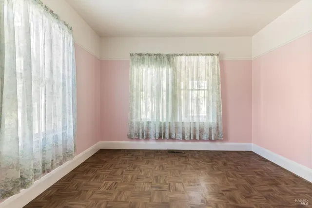 a bathroom with a toilet sink and shower