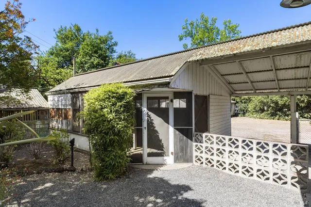 a view of a room with wooden walls