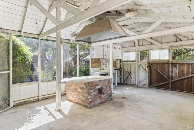 a view of a garage with wooden walls