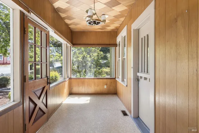 a view of room with window and furniture