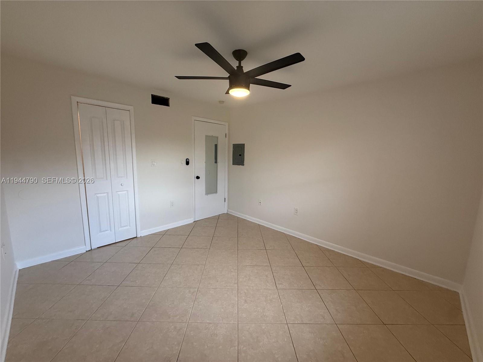 15581 Southwest 104th Terrace, Unit 222 Miami, FL 33196 - Photo 19 of 23 a view of an empty room
