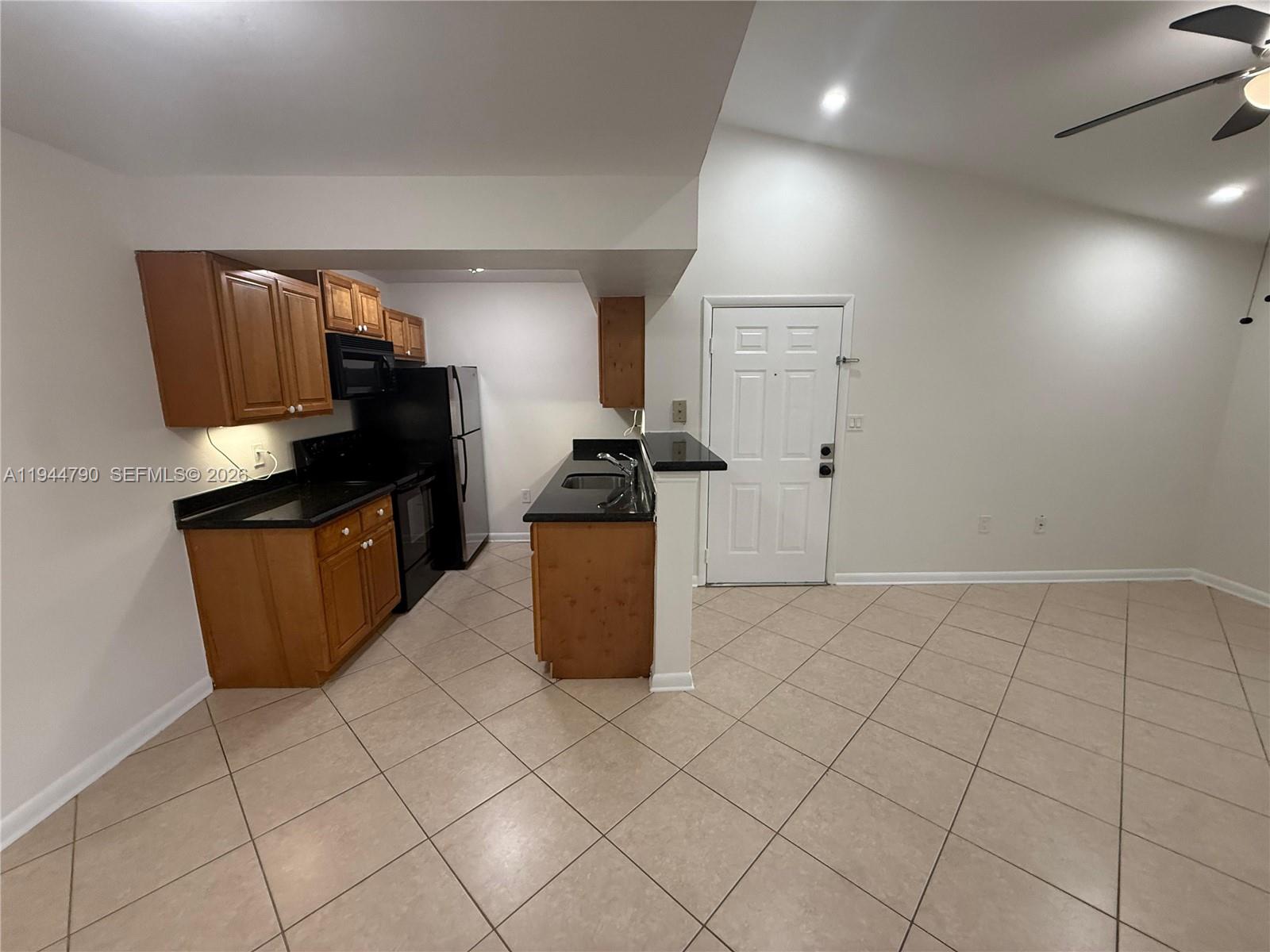 15581 Southwest 104th Terrace, Unit 222 Miami, FL 33196 - Photo 10 of 23 a kitchen with a sink
