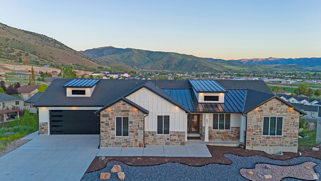 851 Grandview Drive Morgan, UT 84050 - Photo 68 of 68 Contemporary ranch-style exterior featuring stone veneer and white vertical siding