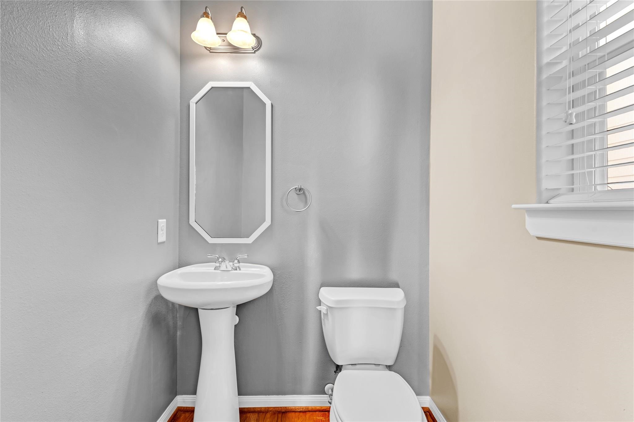 934 West 26th Street, Unit B Houston, TX 77008 - Photo 14 of 33 A half bath is conveniently located on the second floor.