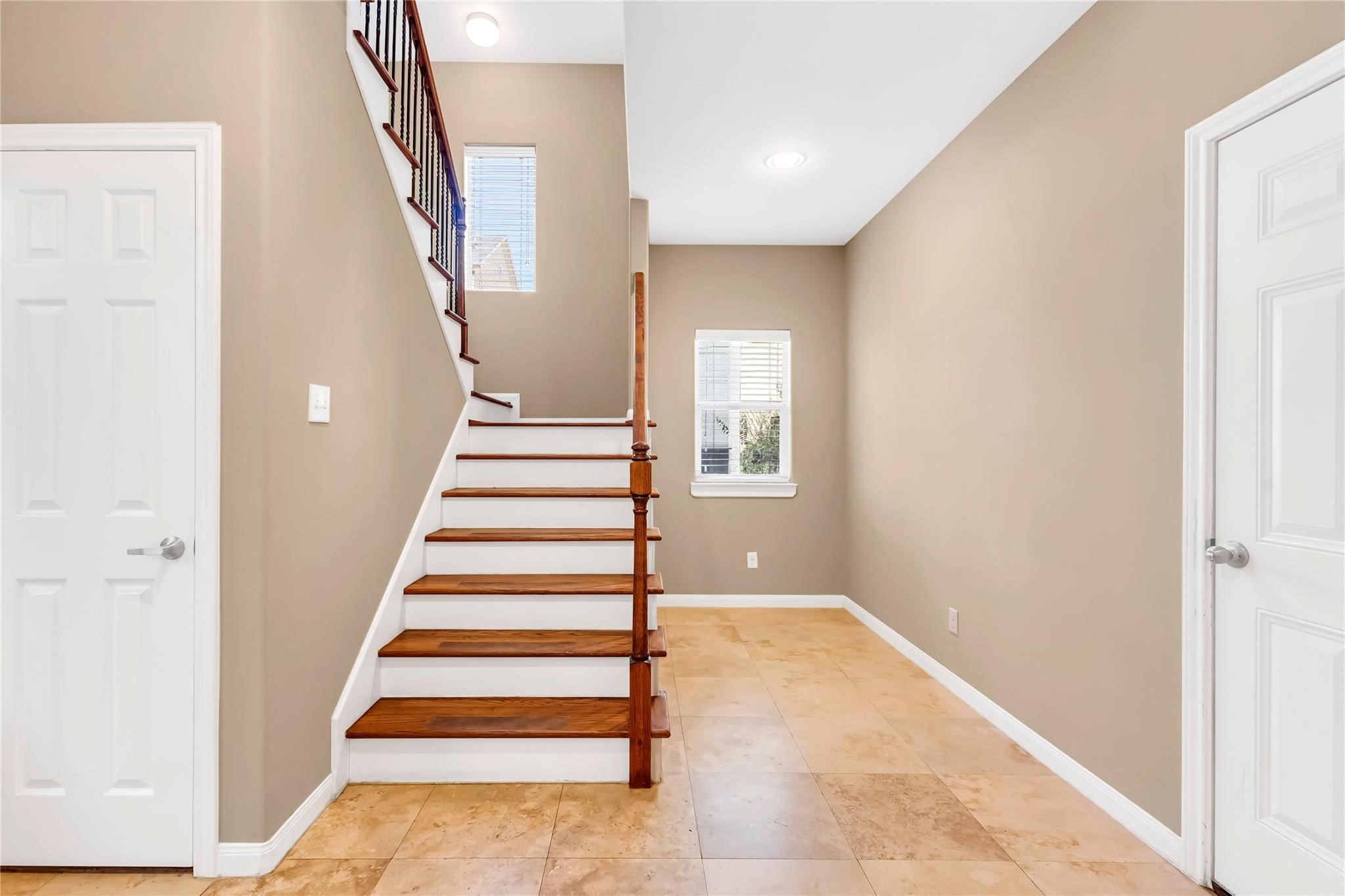 934 West 26th Street, Unit B Houston, TX 77008 - Photo 6 of 33 a view of entryway with wooden floor and stairs