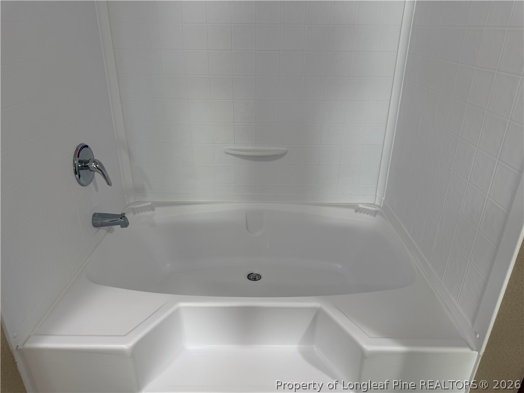 4339 Saddletree Road Lumberton, NC 28360 - Photo 18 of 23 a close up of a bathtub