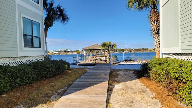 a view of a swimming pool with a yard