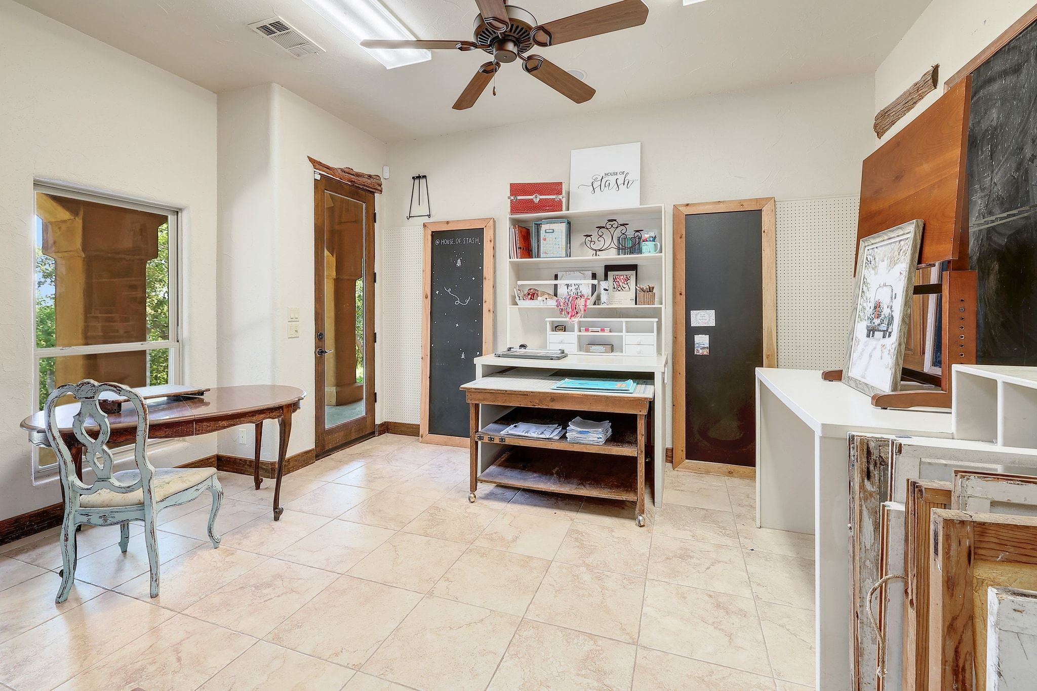 1120 Redbird Road Granger, TX 76530 - Photo 26 of 40 Hobby room featuring a ceiling fan and light tile floors
