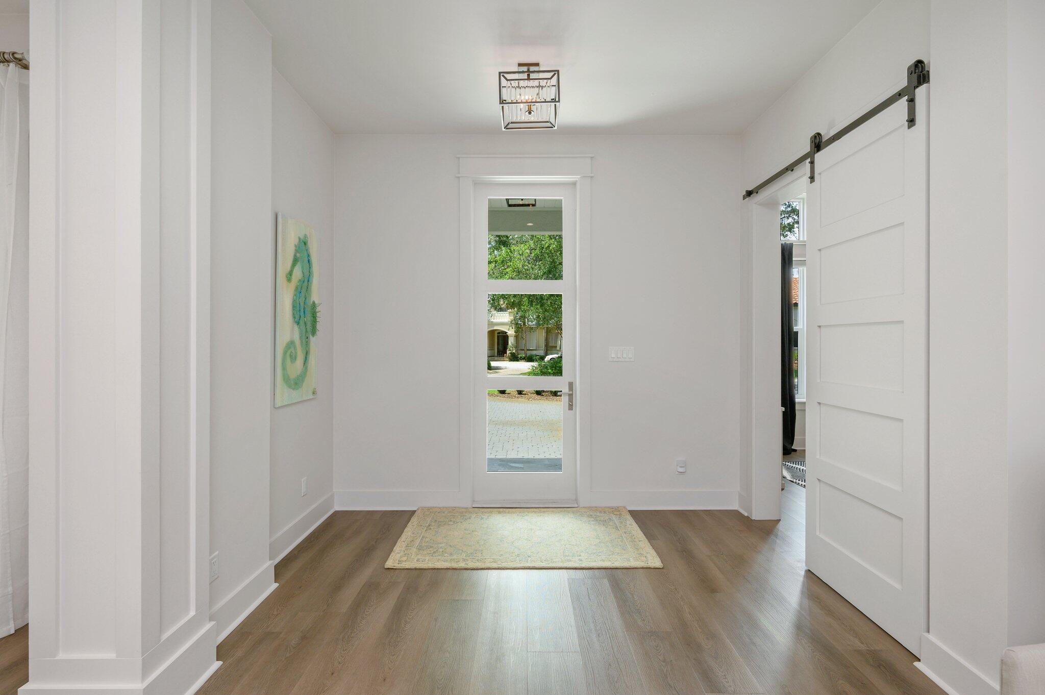 3278 Burnt Pine Circle Miramar Beach, FL 32550 - Photo 25 of 100 an empty room with wooden floor and windows