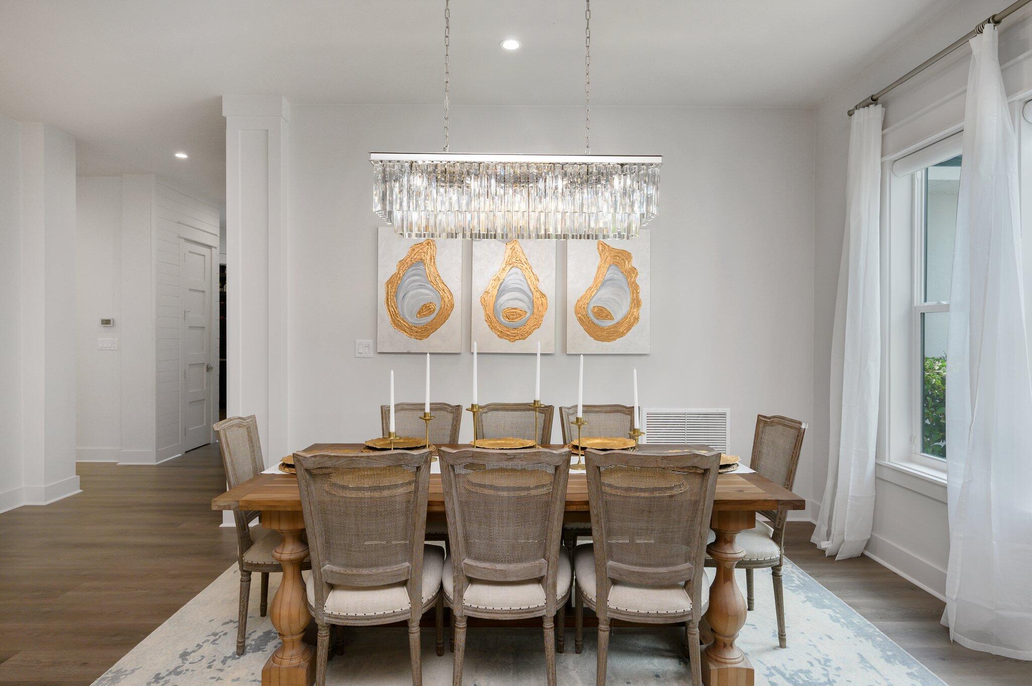 3278 Burnt Pine Circle Miramar Beach, FL 32550 - Photo 30 of 100 a view of a dining room with furniture and chandelier