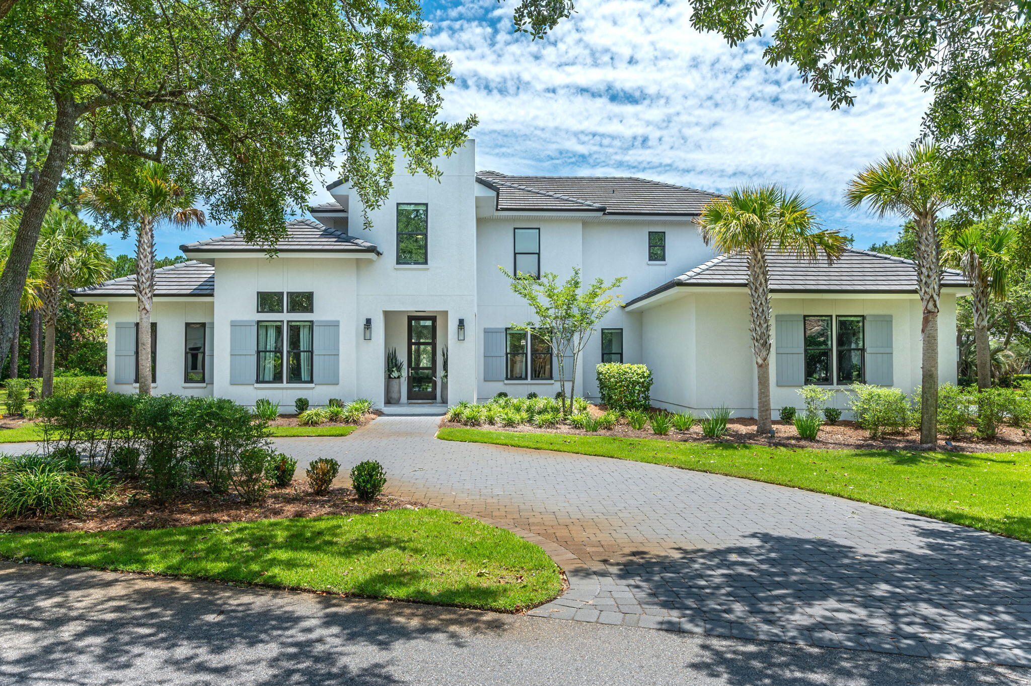 3278 Burnt Pine Circle Miramar Beach, FL 32550 - Photo 3 of 100 a front view of house with yard and green space