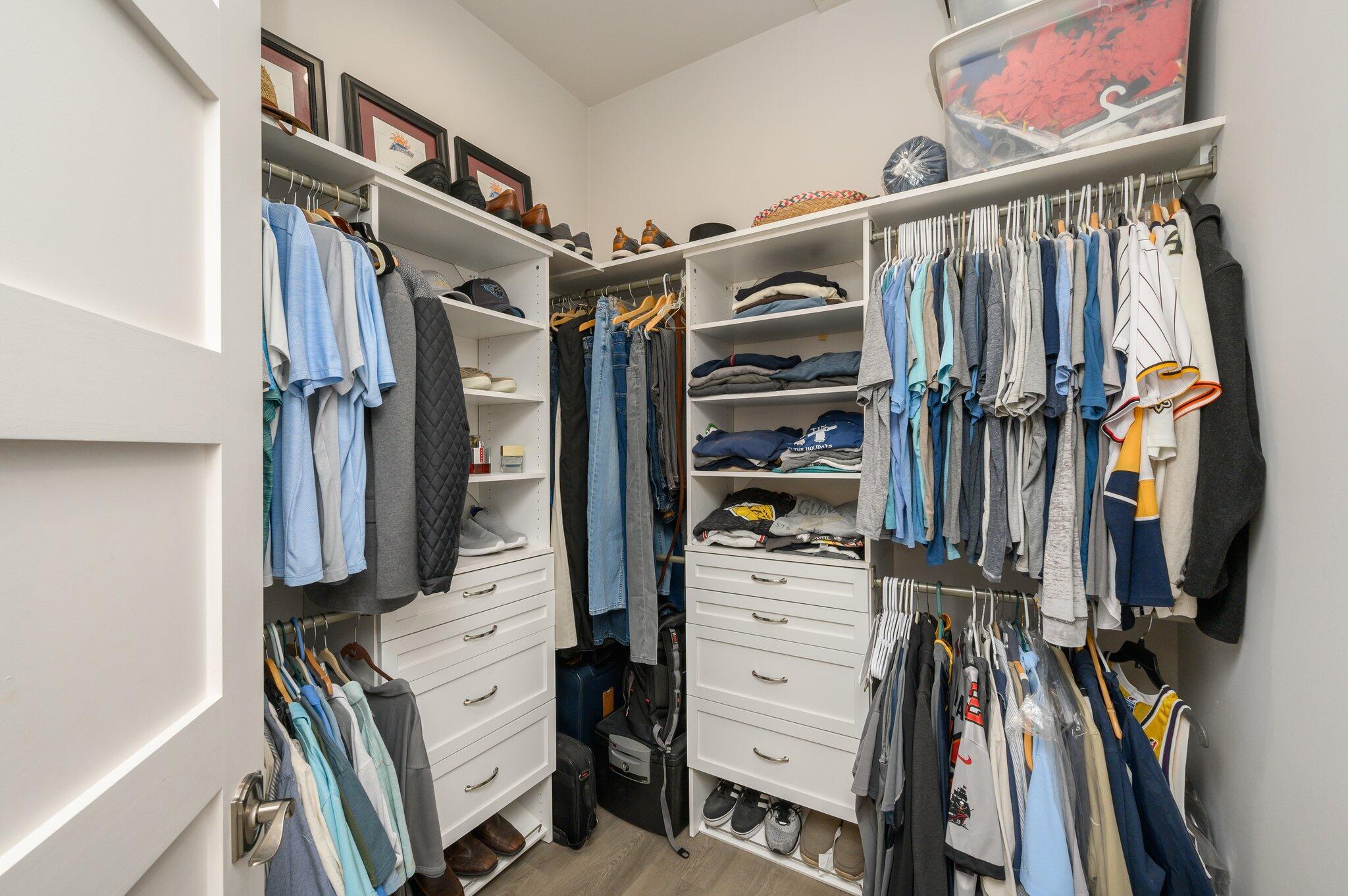 3278 Burnt Pine Circle Miramar Beach, FL 32550 - Photo 42 of 100 a view of walk in closet with clothes and shoes