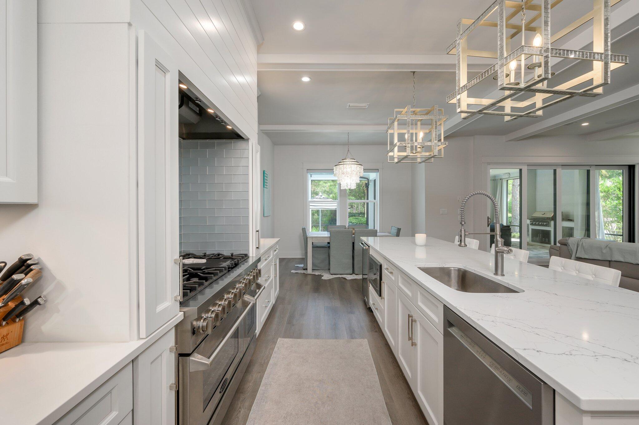 3278 Burnt Pine Circle Miramar Beach, FL 32550 - Photo 57 of 100 a large kitchen with a large counter top appliances and cabinets