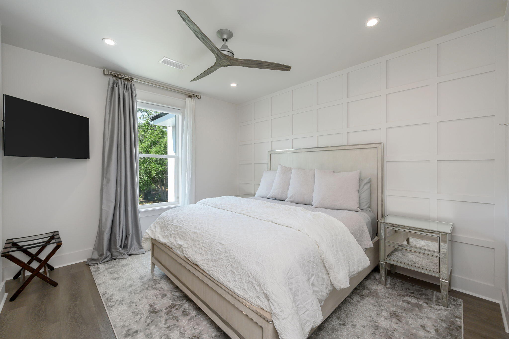 3278 Burnt Pine Circle Miramar Beach, FL 32550 - Photo 76 of 100 a spacious bedroom with a bed and a flat screen tv