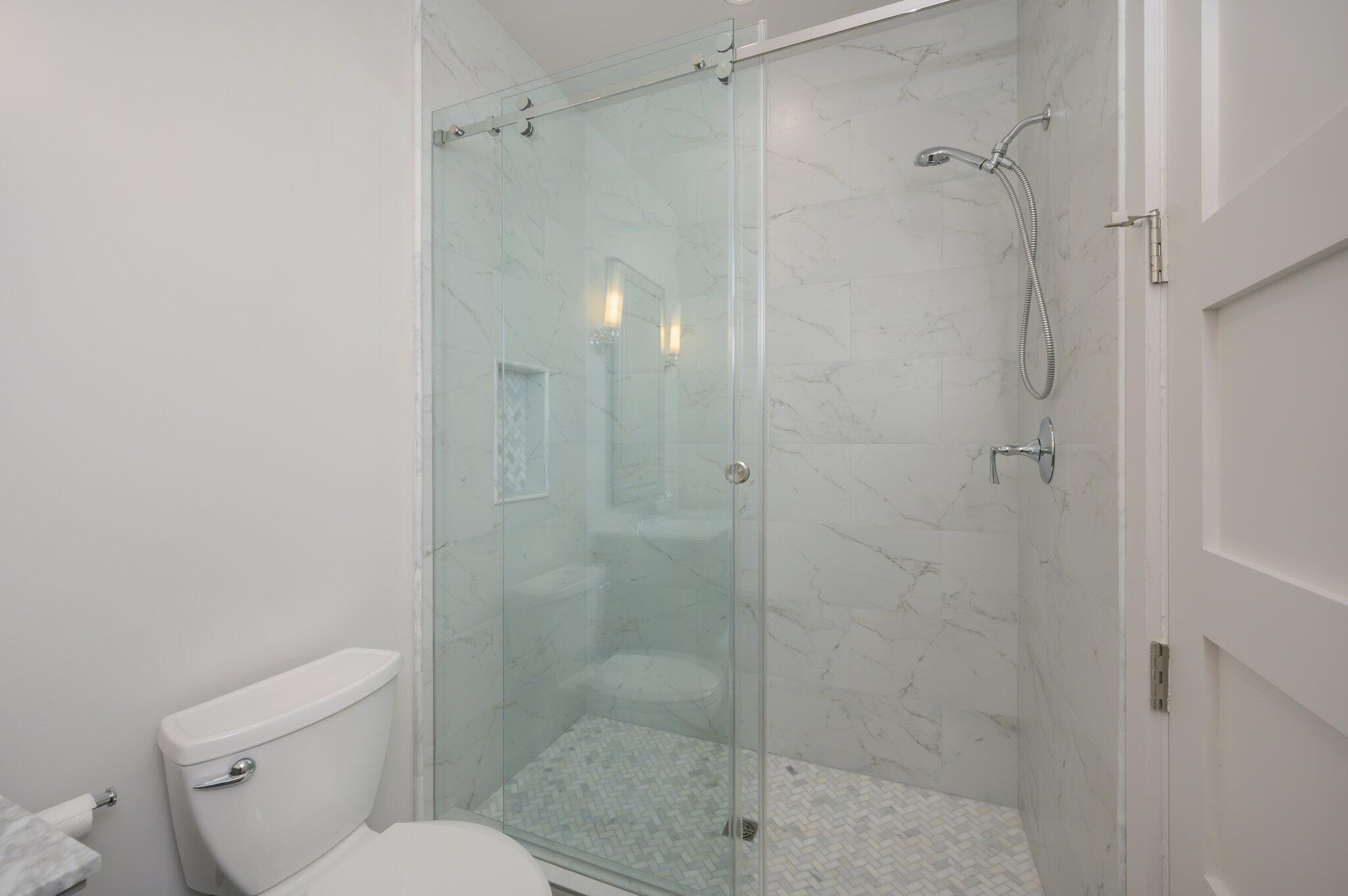 3278 Burnt Pine Circle Miramar Beach, FL 32550 - Photo 79 of 100 a bathroom with a shower and a toilet