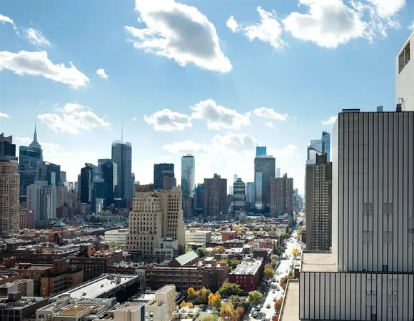a view of a city with tall buildings