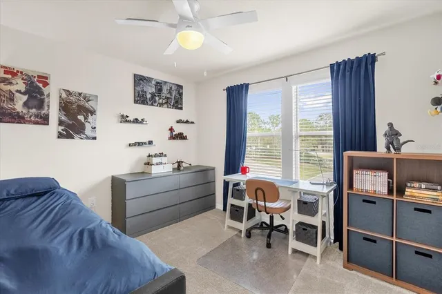 a room with furniture and a window