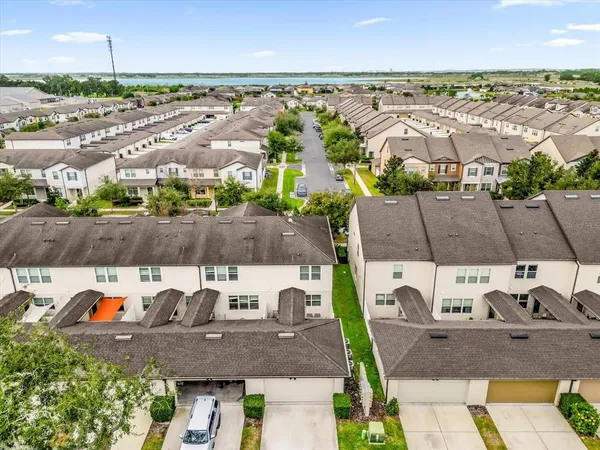 an aerial view of a house with outdoor space