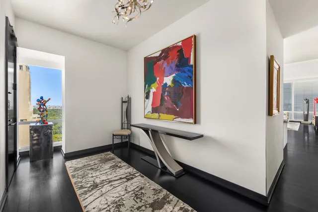 a kitchen with refrigerator and stove