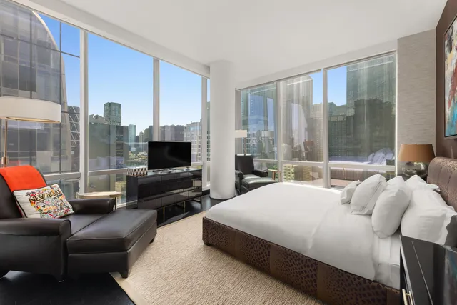 a room with furniture and wooden floor