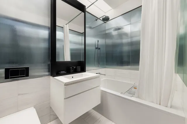 a bed room with a bed and a couch