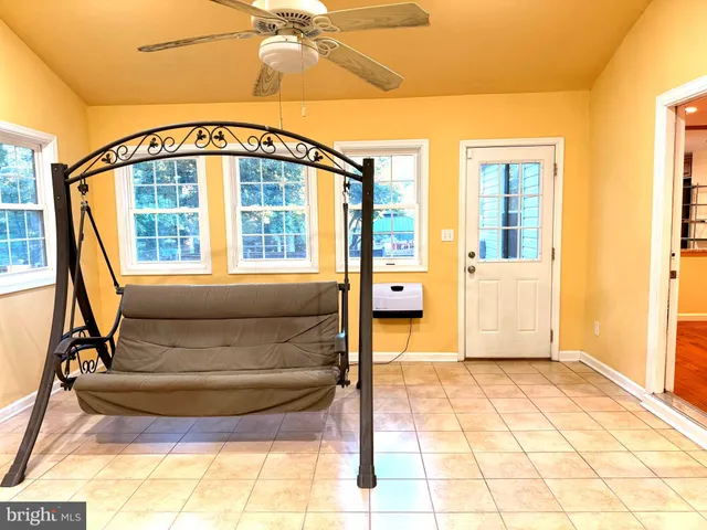 a view of a hallway with a couch