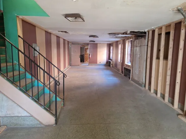 an empty room with windows