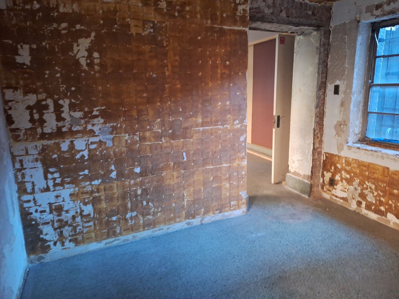 200 West 139th Street Manhattan, NY 10030 - Photo 10 of 24 a view of a hallway with brick walls