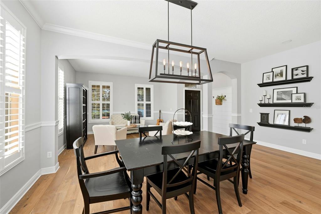 13912 Darchance Road Windermere, FL 34786 - Photo 12 of 49 a view of a dining room with furniture window and wooden floor