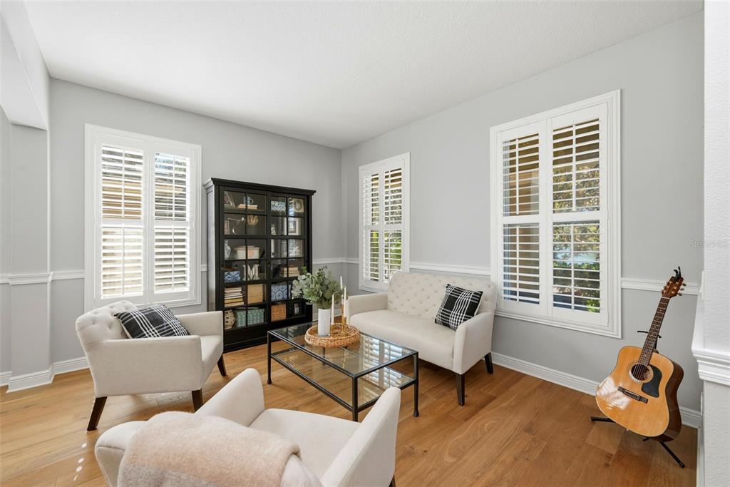 13912 Darchance Road Windermere, FL 34786 - Photo 13 of 49 a living room with furniture and a window