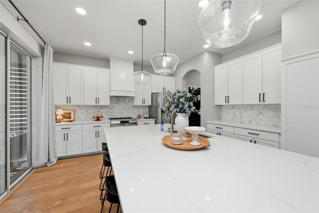 13912 Darchance Road Windermere, FL 34786 - Photo 19 of 49 a kitchen with a table and chairs in it
